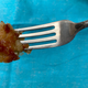 A piece of mock apple pie on a fork